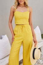 Women's mango shirred bodice crop top styled with wide leg pants by Esther & Co
