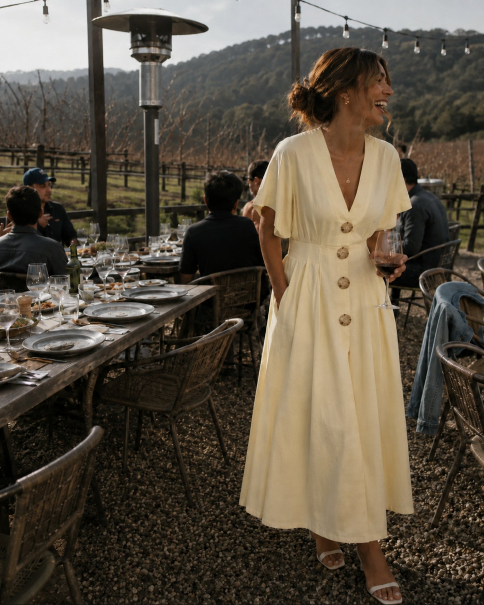 Women's buttercream yellow v-neck maxi dress with fitted waist panel, the Clairice Dress in Buttercream by Esther & Co
