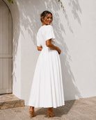 Women's white v-neck button front maxi dress with kimono sleeves, the Clairice Dress in White by Esther & Co