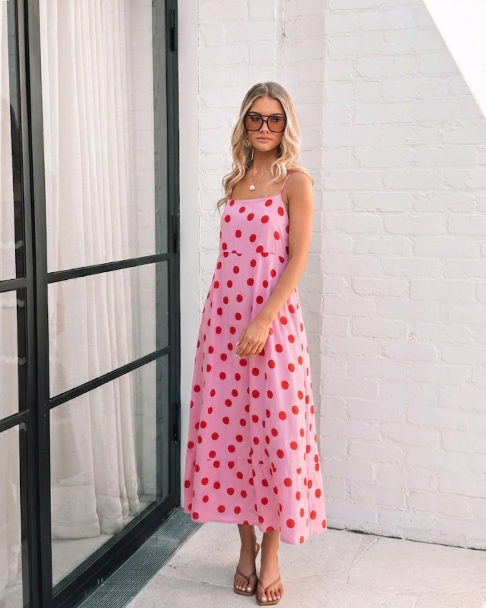 Women's pink polka dot midi dress, the Crescent Pink Spot Dress by Esther & Co
