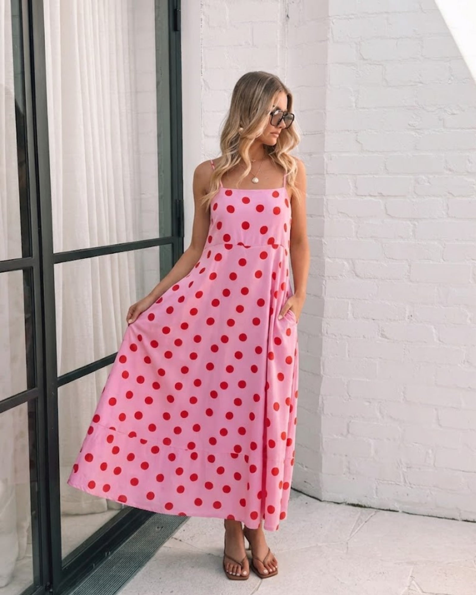 Women's pink spot midi dress front view by Esther & Co