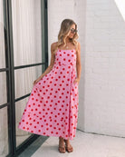 Women's pink spot midi dress front view by Esther & Co