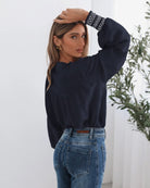 Dareia Blouse in Navy Print navy print blouse close up yoke and cuff contrast stitching