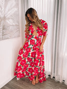 Women's pink floral print maxi dress with v-neckline and waist cut-out, the Delarina Dress in Pink Floral by Esther & Co