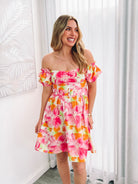 Women's pink blossom print mini dress with sweetheart off-shoulder neckline, the Devira Dress in Pink Blossom by Esther & Co