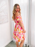 Women's pink floral print mini dress with waist tie by Esther & Co