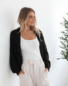 Dorine Cardigan in Black womens black open-front chunky knit cardigan styled outfit