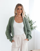 Dorine forest green open-front knit cardigan, styled view