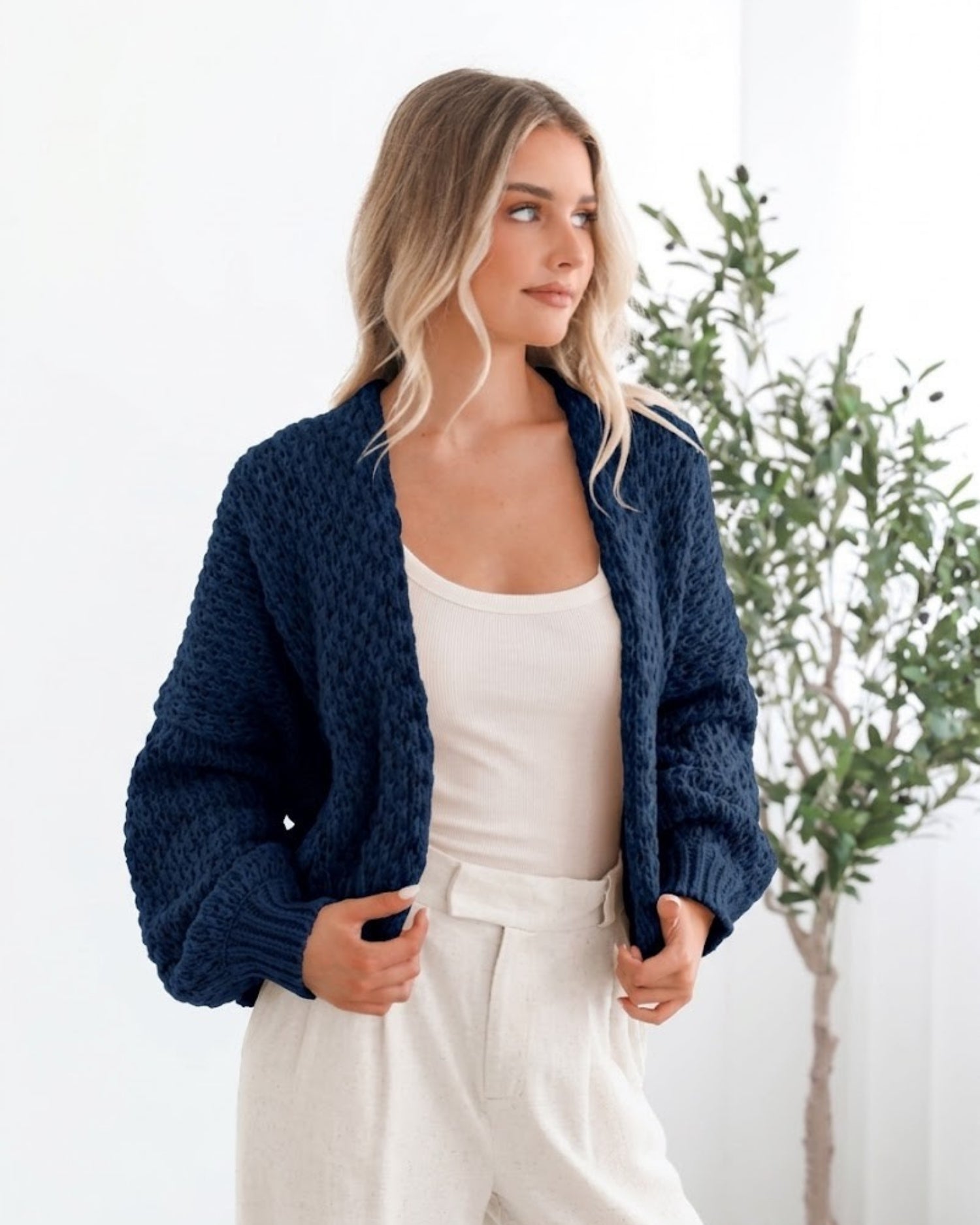 Dorine Cardigan in Navy navy knit cardigan side view