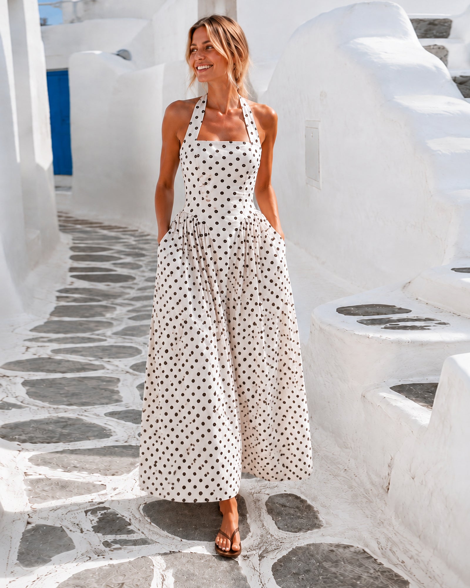 Women's cream polka dot maxi dress with low back back view by Esther & Co