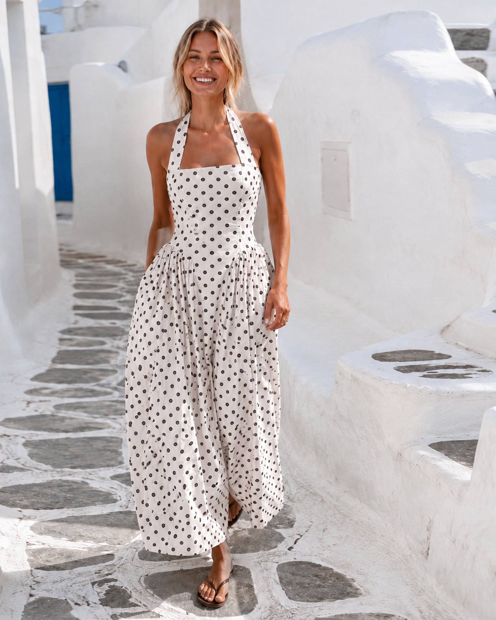 Women's cream polka dot halter maxi dress styled outfit by Esther & Co