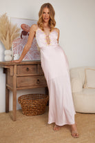 Women's pink satin maxi dress with sweetheart plunge neckline and floral applique, the Elice Dress in Pink by Esther & Co
