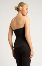 Women's black strapless peplum top rear view by Esther & Co