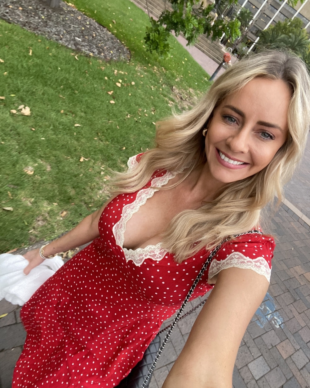 Women's red polka dot mini dress side view by Esther & Co