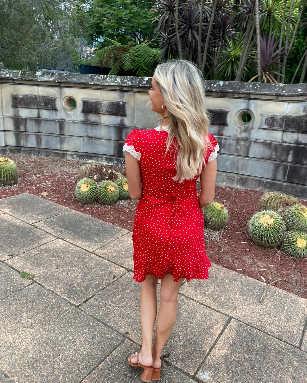 Women's red polka dot mini dress styled outfit by Esther & Co