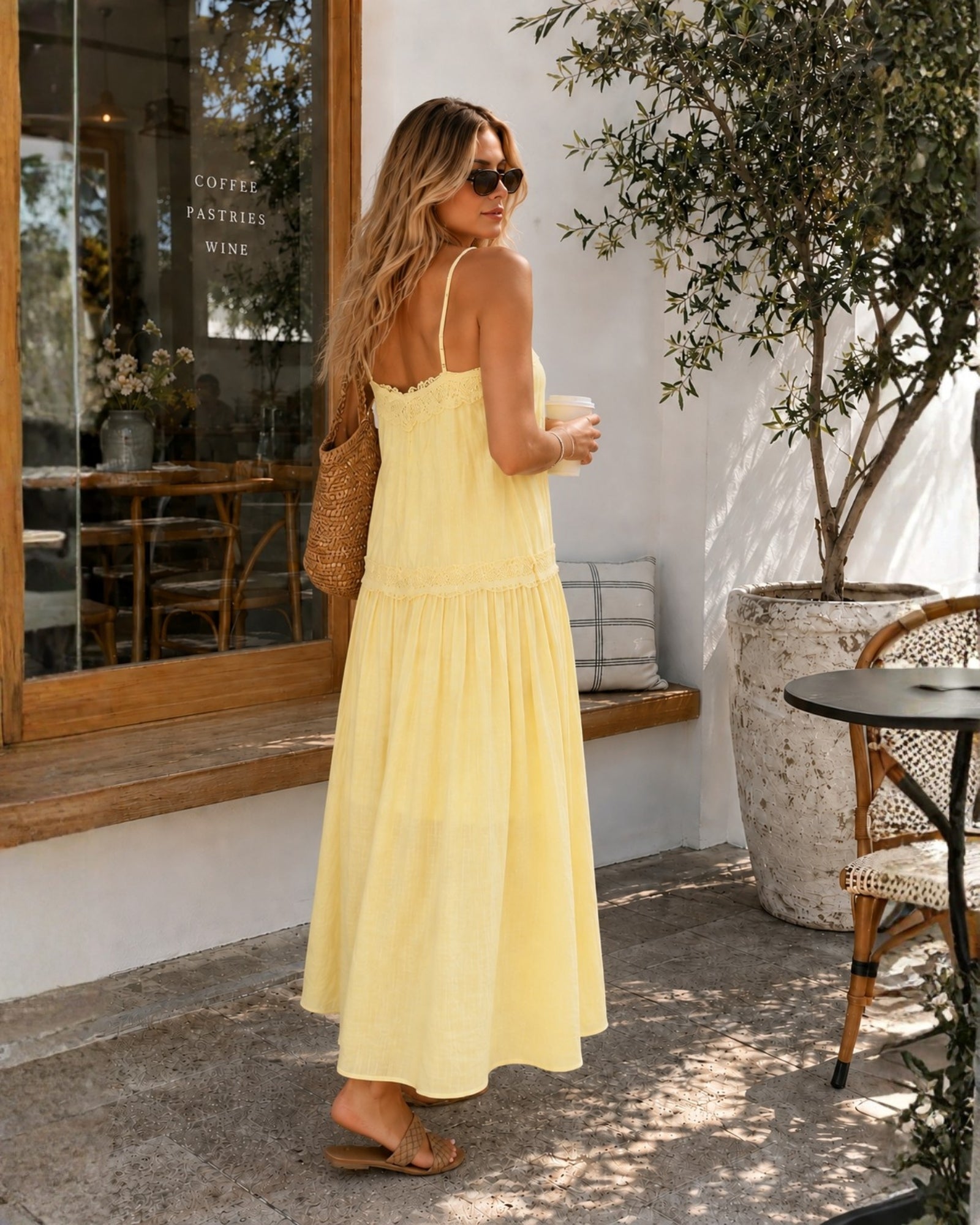 Women's soft pastel yellow v-neck midi dress with lace detail, the Glynnis Dress in Primrose Yellow by Esther & Co
