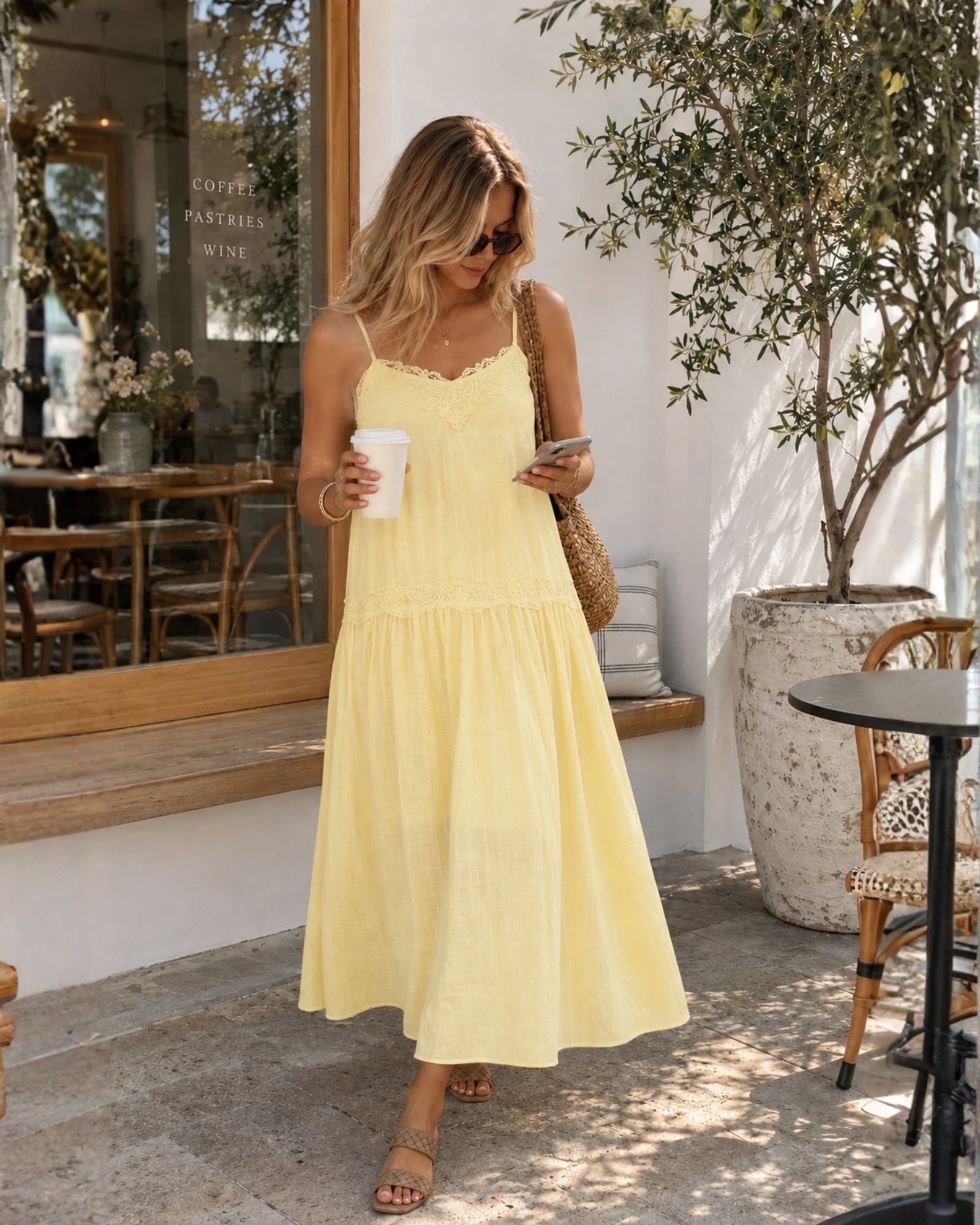 Women's pastel yellow v-neck midi dress, the Glynnis Dress in Primrose Yellow by Esther & Co