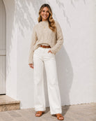 Women's beige relaxed fit knit jumper with high round neckline, the Hadi Knit in Beige by Esther & Co