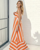 Women's orange stripe maxi dress styled outfit by Esther & Co