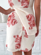 Women's high-waisted floral mini skirt styled for picnic by Esther & Co