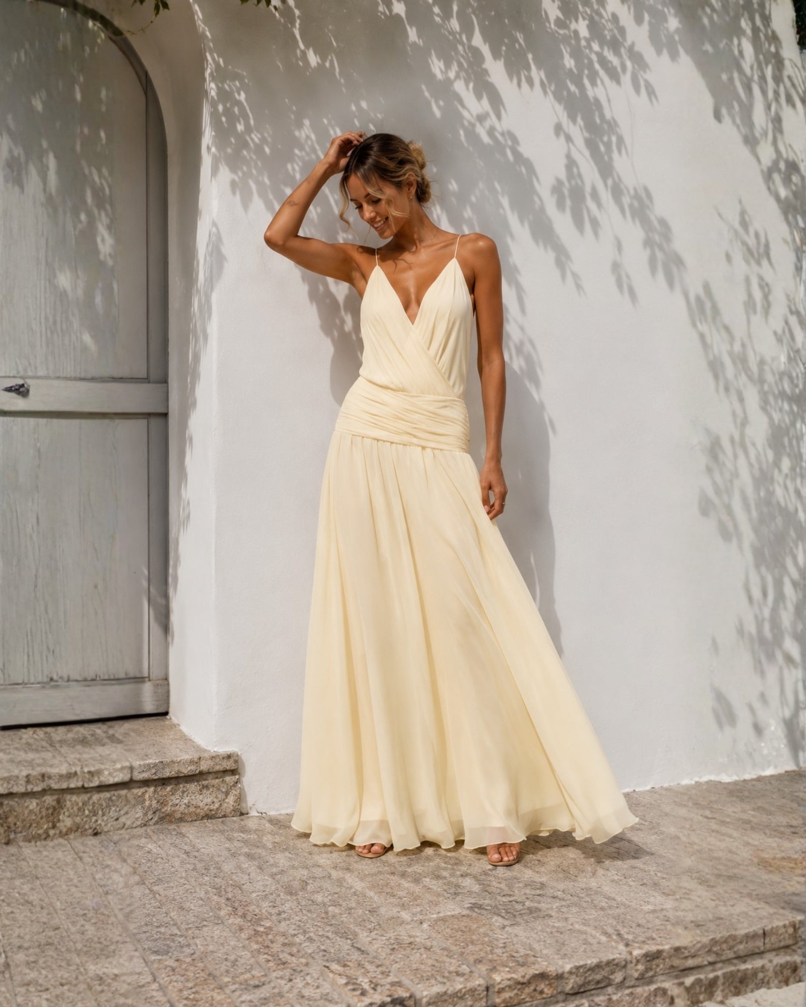 Women's pastel yellow plunge neck maxi dress, the Hermione Dress in Sunlit Veil by Esther & Co