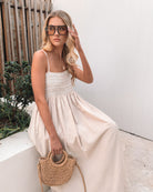 Ilyndra Dress in Beige Multi beige and white cotton maxi with side pockets full length