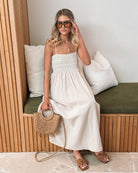 Ilyndra Dress in Beige Multi beige cotton maxi dress styled with straw hat