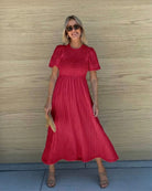 Women's cherry red cotton midi dress with shirred bodice, the Iolana Dress in Cherry by Esther & Co