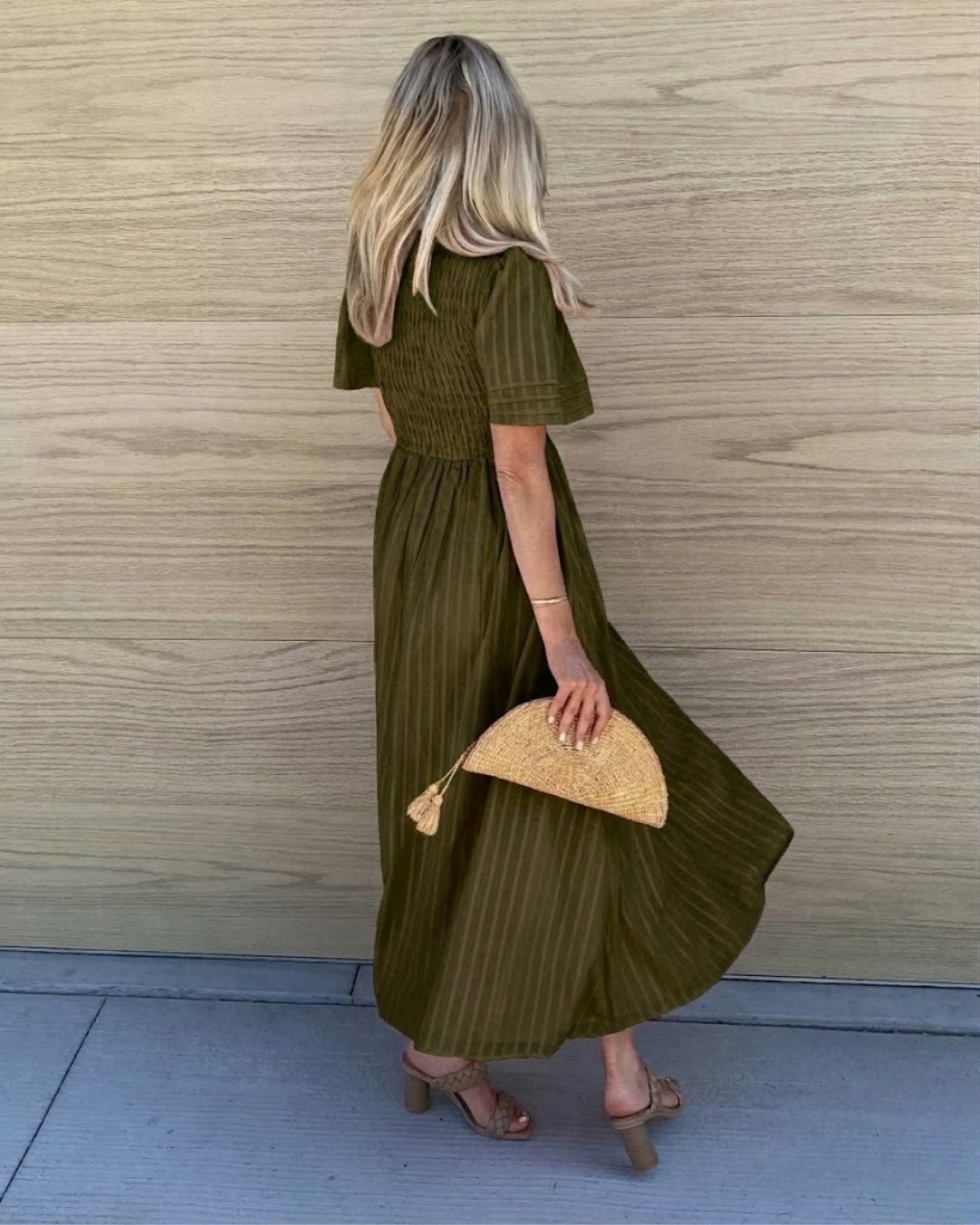 Women's flowy dark olive cotton dress styled for day to evening by Esther & Co