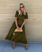 Women's dark olive cotton midi dress with shirred bodice, the Iolana Dress in Dark Olive by Esther & Co