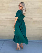Iolana Dress in Deep Green deep green cotton smock midi dress side view