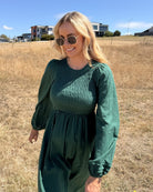 Iolana Dress in Deep Green Long Sleeve deep green shirred midi dress close up detail