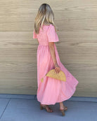 Iolana Dress in Pink pink A-line smock midi dress full length view