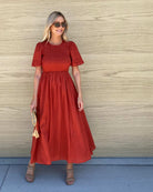Iolana rust smock midi dress, side view