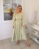 Iolana Dress in Soft Khaki Long Sleeve soft khaki long sleeve womens midi back view