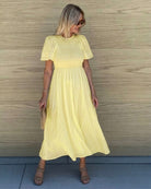 Women's sunshine yellow a-line midi dress with crew neckline by Esther & Co