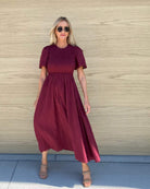 Iolana Dress in Wine rich wine red cotton smock midi full length view