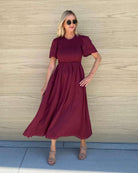 Iolana Dress in Wine wine red cotton smock midi dress side view