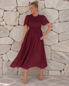 Iolana Dress in Wine womens wine red cotton short sleeve midi dress by Esther & Co