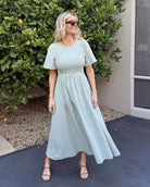 Iolana Dress in Soft Khaki womens cotton smock midi dress in soft khaki front view