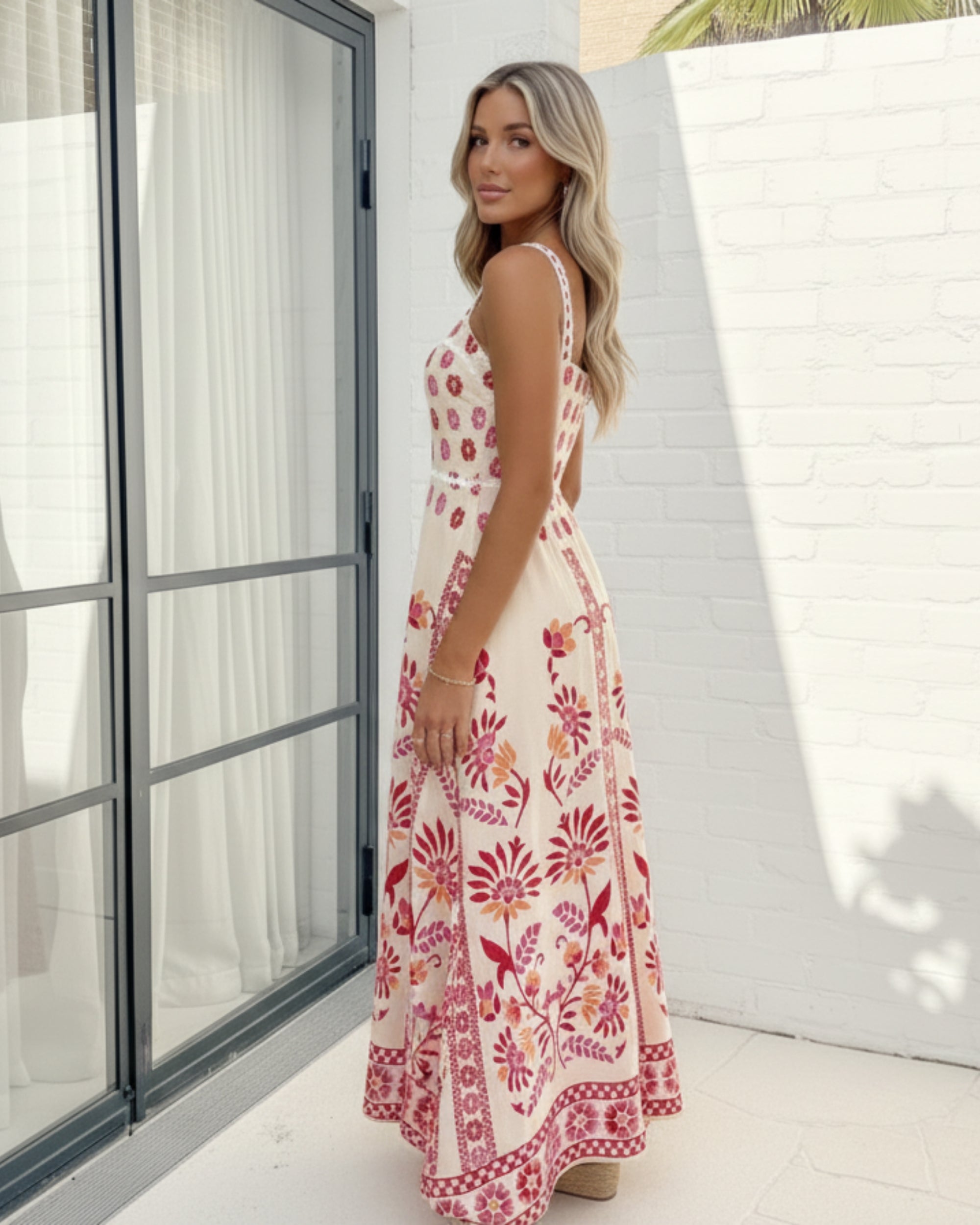 Women's pink printed maxi dress front view by Esther & Co