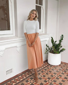 Women's peach multi knit maxi dress front view by Esther & Co
