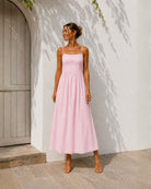 Women's pastel pink midi dress with fitted panelled bodice by Esther & Co