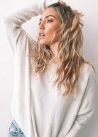 Joansy Knit in White white ribbed knit jumper with high-low finish side view