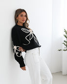 Junaelle Knit in Black Multi black and cream bow detail knit jumper back view
