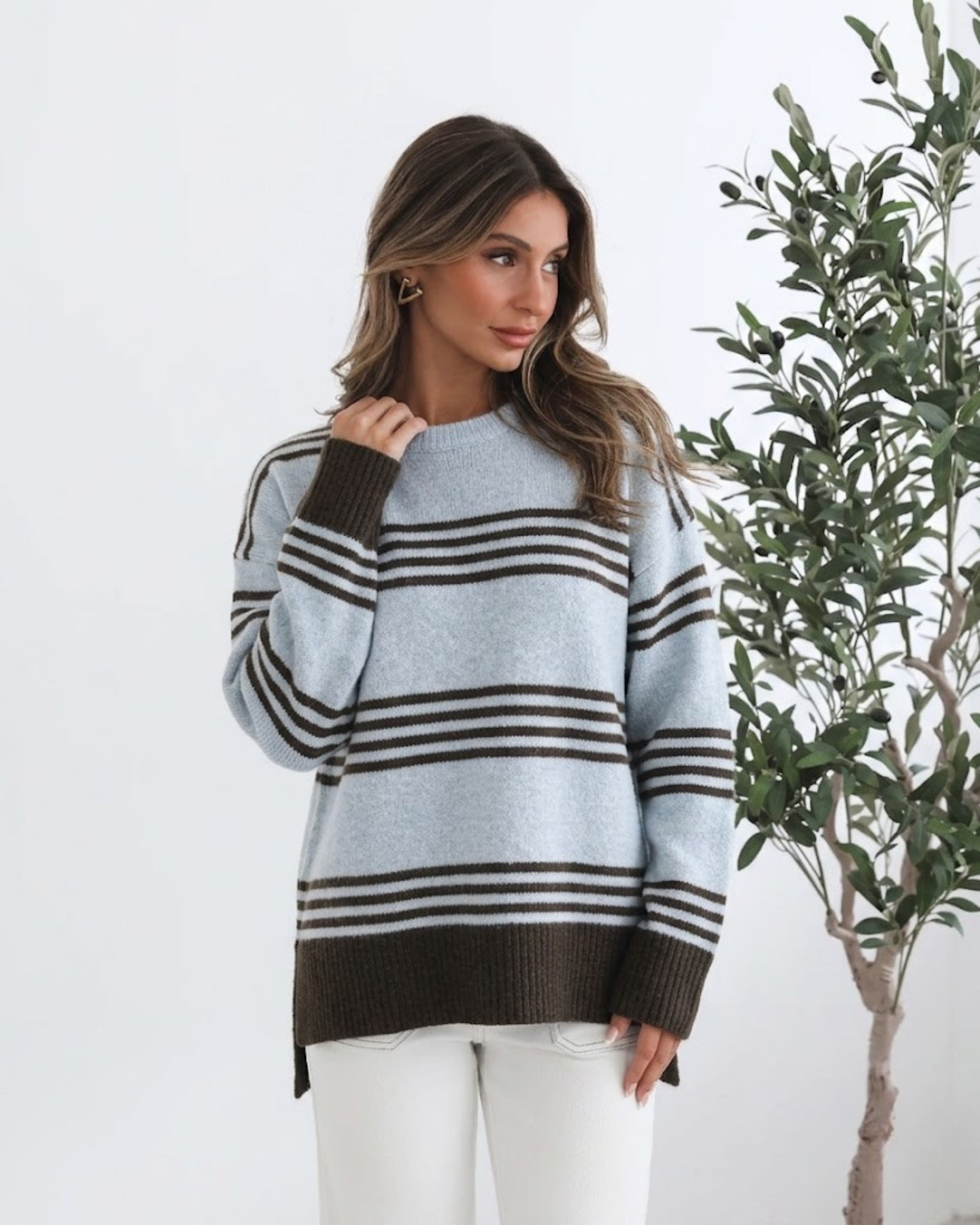 Kessie Knit in Blue Stripe blue and chocolate stripe knit with ribbed cuffs side view