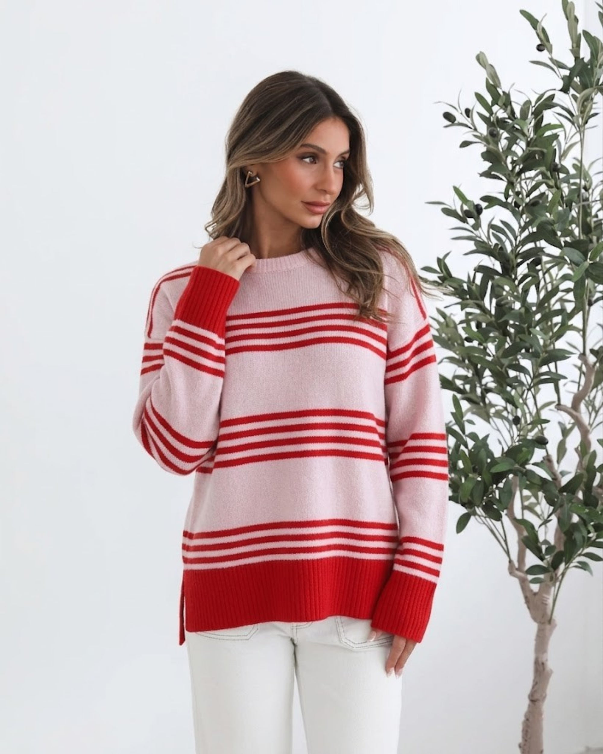 Women's pink stripe knit jumper front view by Esther & Co
