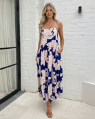 Women's navy floral maxi dress styled outfit by Esther & Co