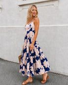 Women's navy floral maxi dress styled outfit by Esther & Co