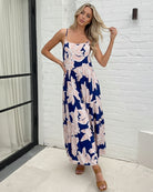 Women's navy floral print maxi dress full length view by Esther & Co